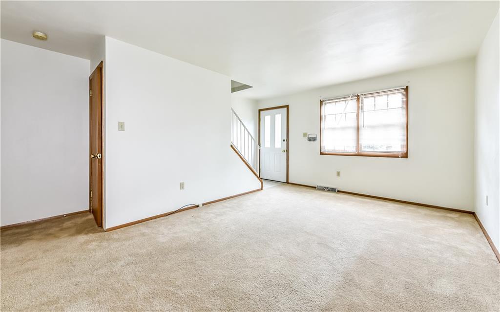 515 Barclay Avenue Pittsburgh, PA 15221 - Photo 5 of 14 an empty room with windows and closet