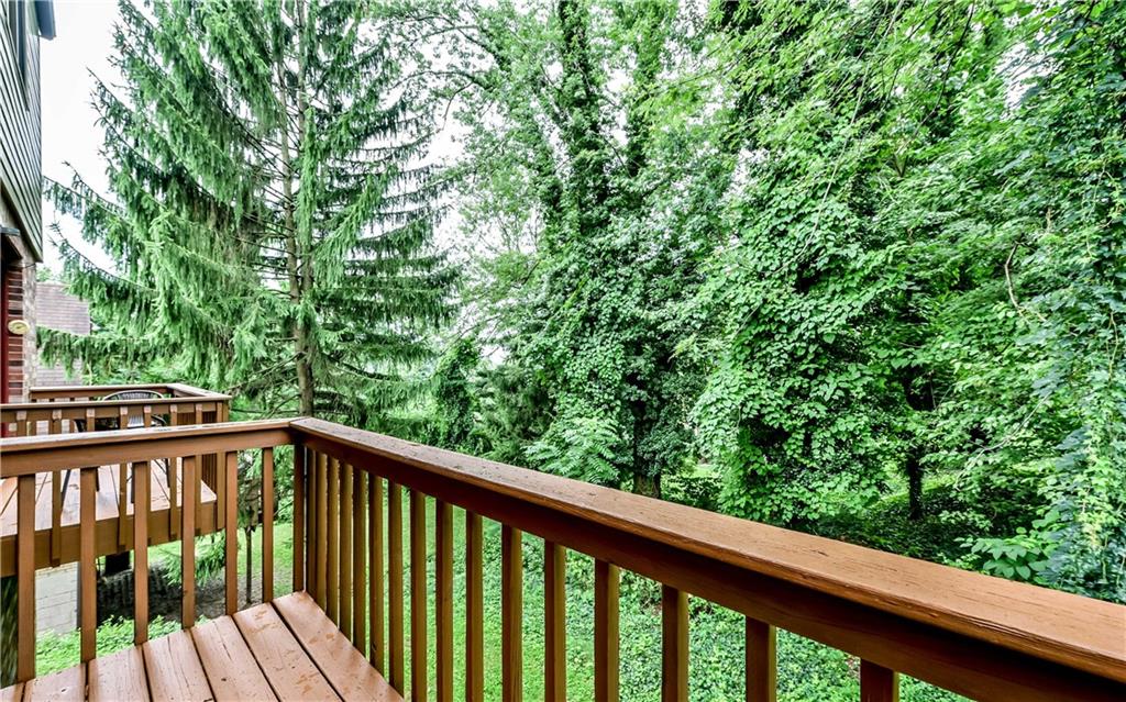 515 Barclay Avenue Pittsburgh, PA 15221 - Photo 8 of 14 a view of a balcony with wooden floor