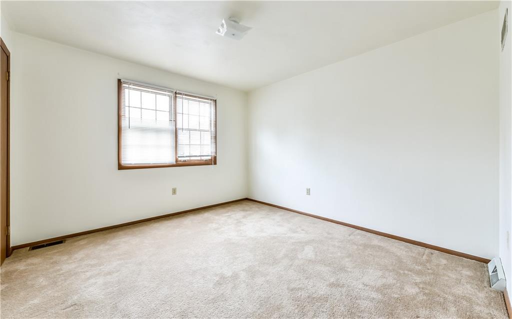 515 Barclay Avenue Pittsburgh, PA 15221 - Photo 10 of 14 an empty room with a window