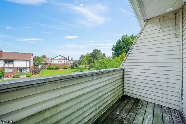 a view of a balcony with an outdoor space