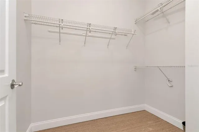 a view of a room with racks on the wall