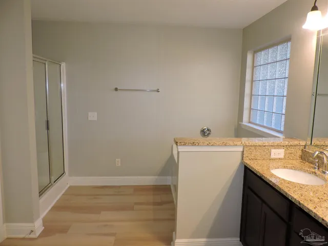 a utility room with a sink washer and dryer