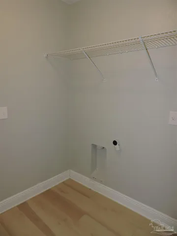 a view of a room with empty racks on the wall