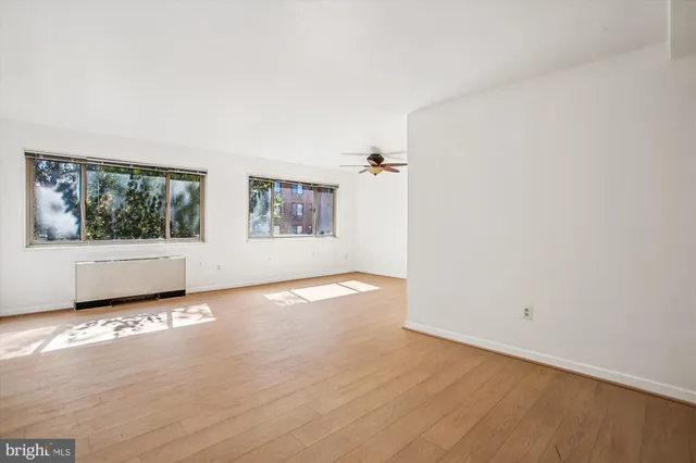 an empty room with windows