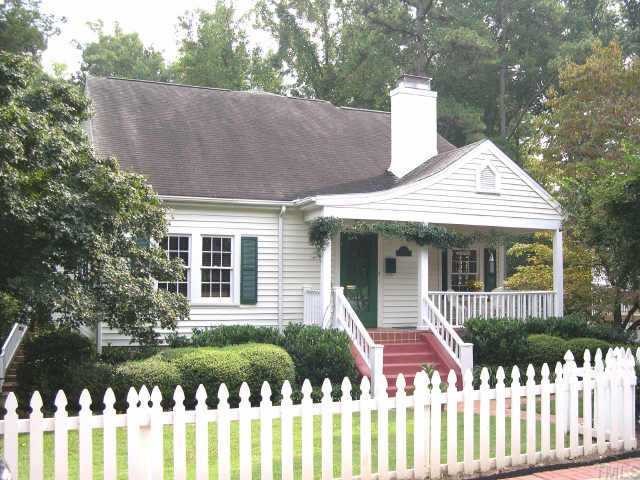 2300 Hales Road Raleigh, NC 27608 - Photo 1 of 1 a front view of a house with a garden