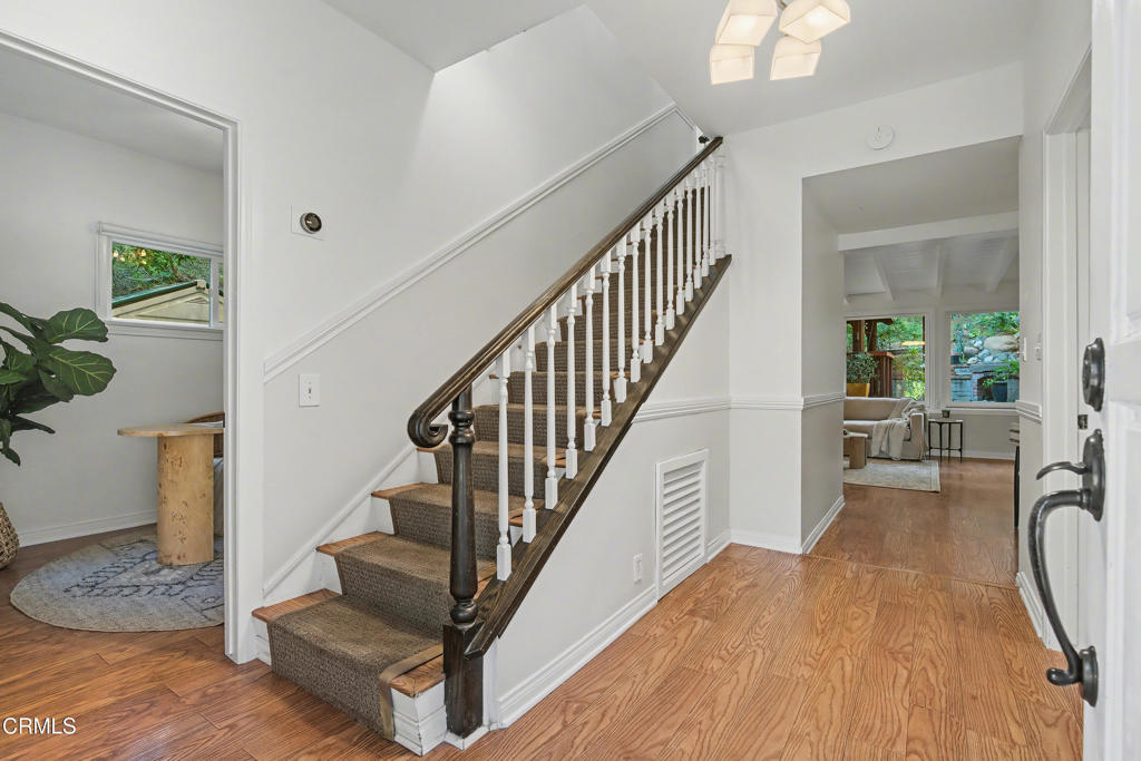 640 Chaparral Road Sierra Madre, CA 91024 - Photo 16 of 25 a view of entryway and hall with wooden floor