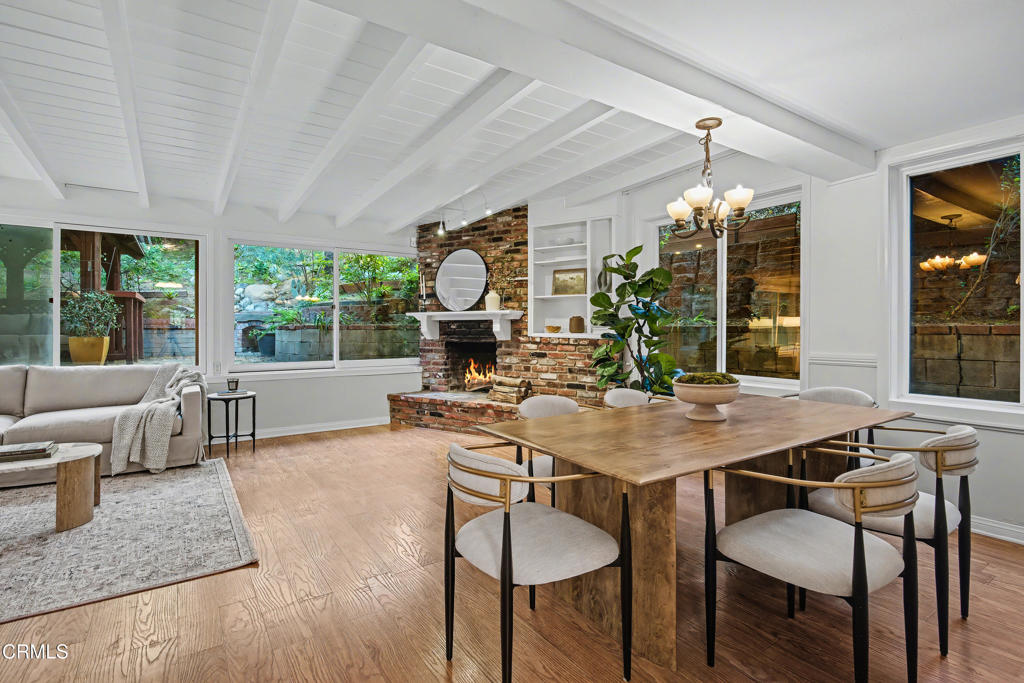 640 Chaparral Road Sierra Madre, CA 91024 - Photo 2 of 25 a view of a dining room with furniture window and outside view