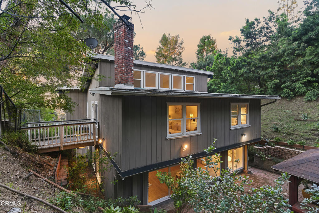 640 Chaparral Road Sierra Madre, CA 91024 - Photo 22 of 25 a front view of a house with garden