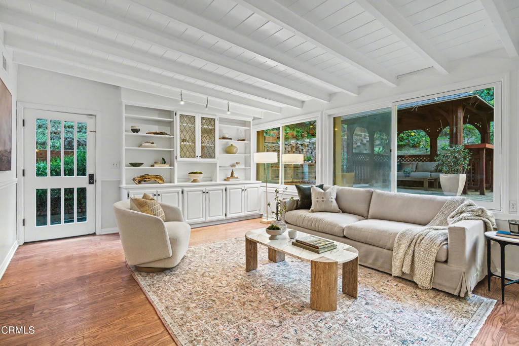 640 Chaparral Road Sierra Madre, CA 91024 - Photo 4 of 25 a living room with furniture and a large window