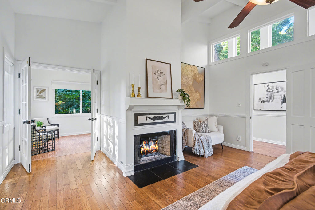 640 Chaparral Road Sierra Madre, CA 91024 - Photo 5 of 25 a living room with furniture and a fireplace