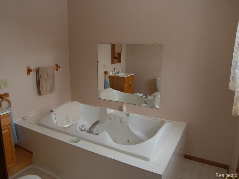 5750 Denhoff Road Kingston, MI 48741 - Photo 9 of 19 5750 attached master bathroom.jpg