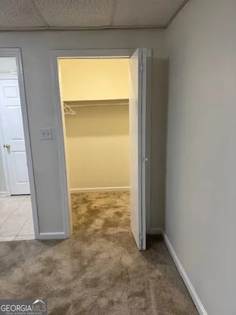 an empty room with a outdoor space