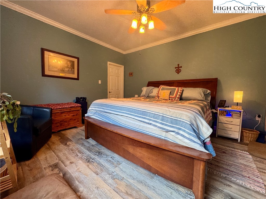 449 Meadow Ridge Drive Jefferson, NC 28640 - Photo 16 of 40 a bedroom with bed and window