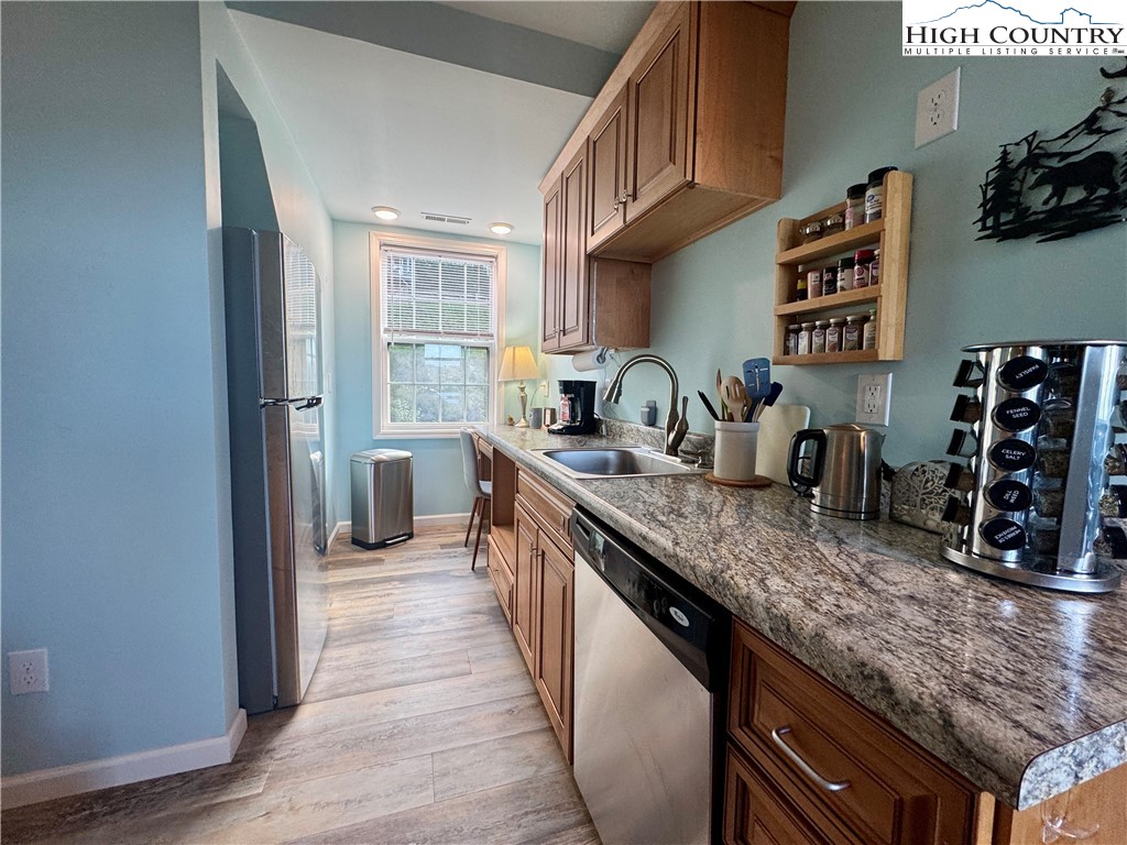 449 Meadow Ridge Drive Jefferson, NC 28640 - Photo 30 of 40 a kitchen with counter top space and cabinets
