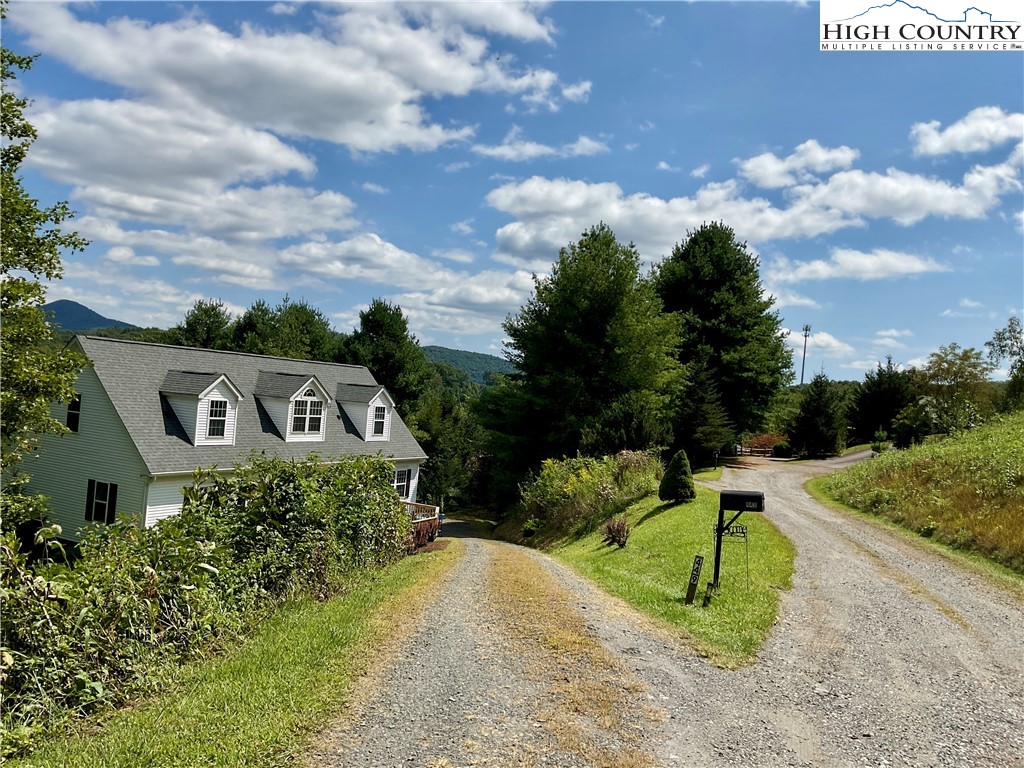 449 Meadow Ridge Drive Jefferson, NC 28640 - Photo 6 of 40 a view of a garden with a slide