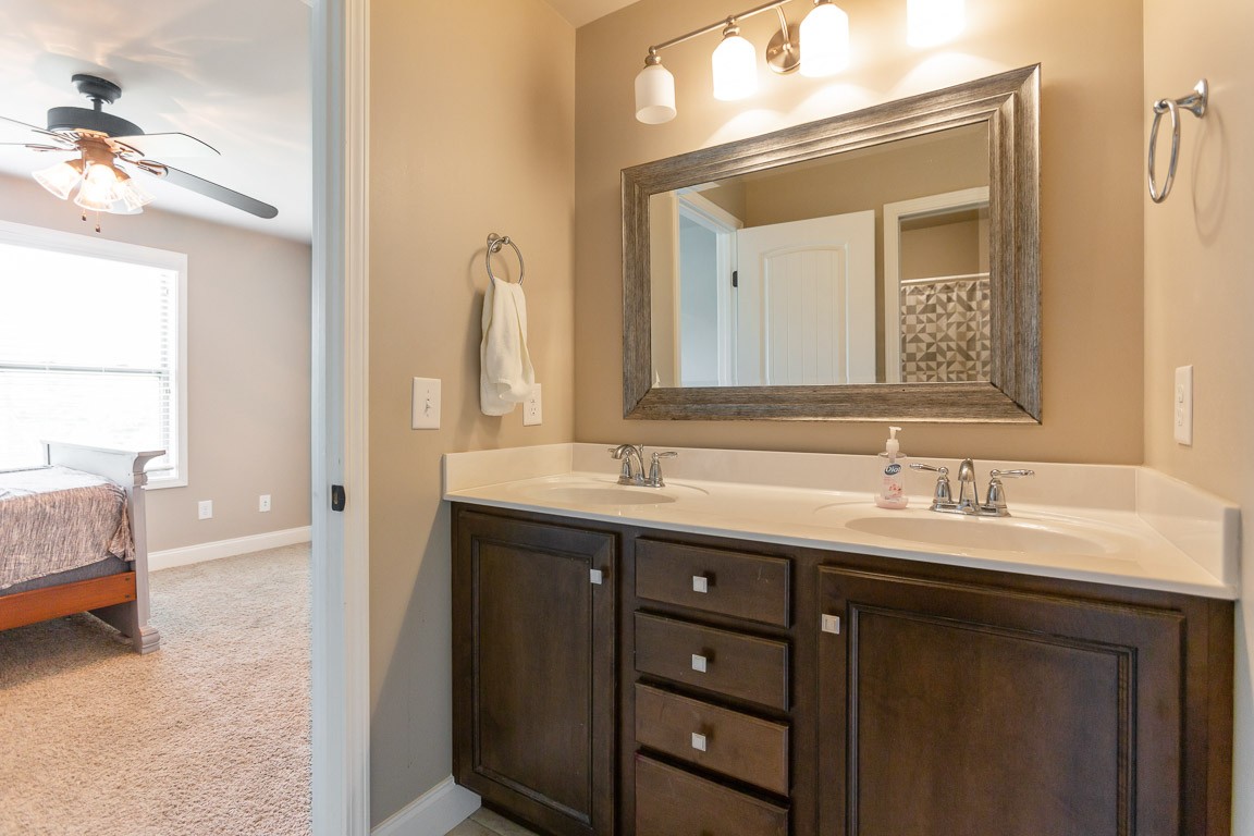 3501 Earhart Road Mount Juliet, TN 37122 - Photo 31 of 42 a en suite bathroom with a double vanity sink and a mirror