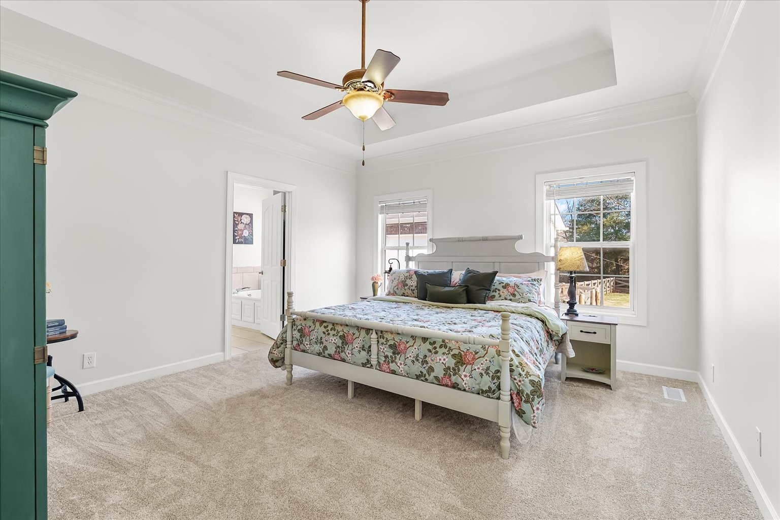 140 Glider Loop Eagleville, TN 37060 - Photo 21 of 39 a bedroom with a bed chandelier and a window