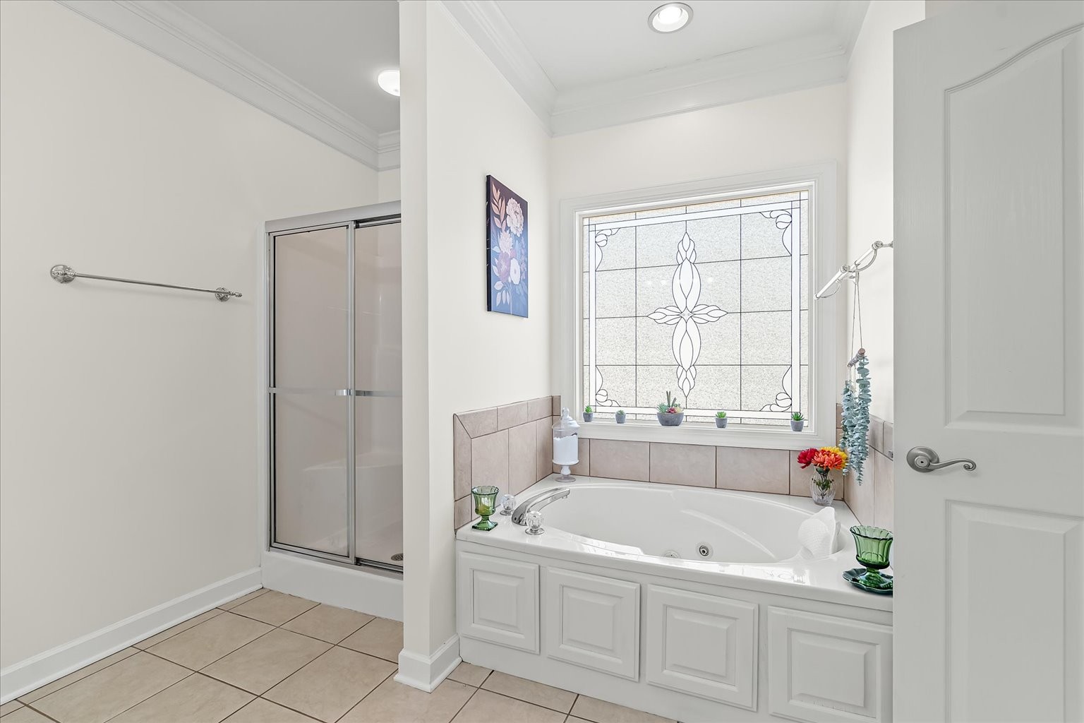 140 Glider Loop Eagleville, TN 37060 - Photo 24 of 39 a bathroom with a tub a sink and a window