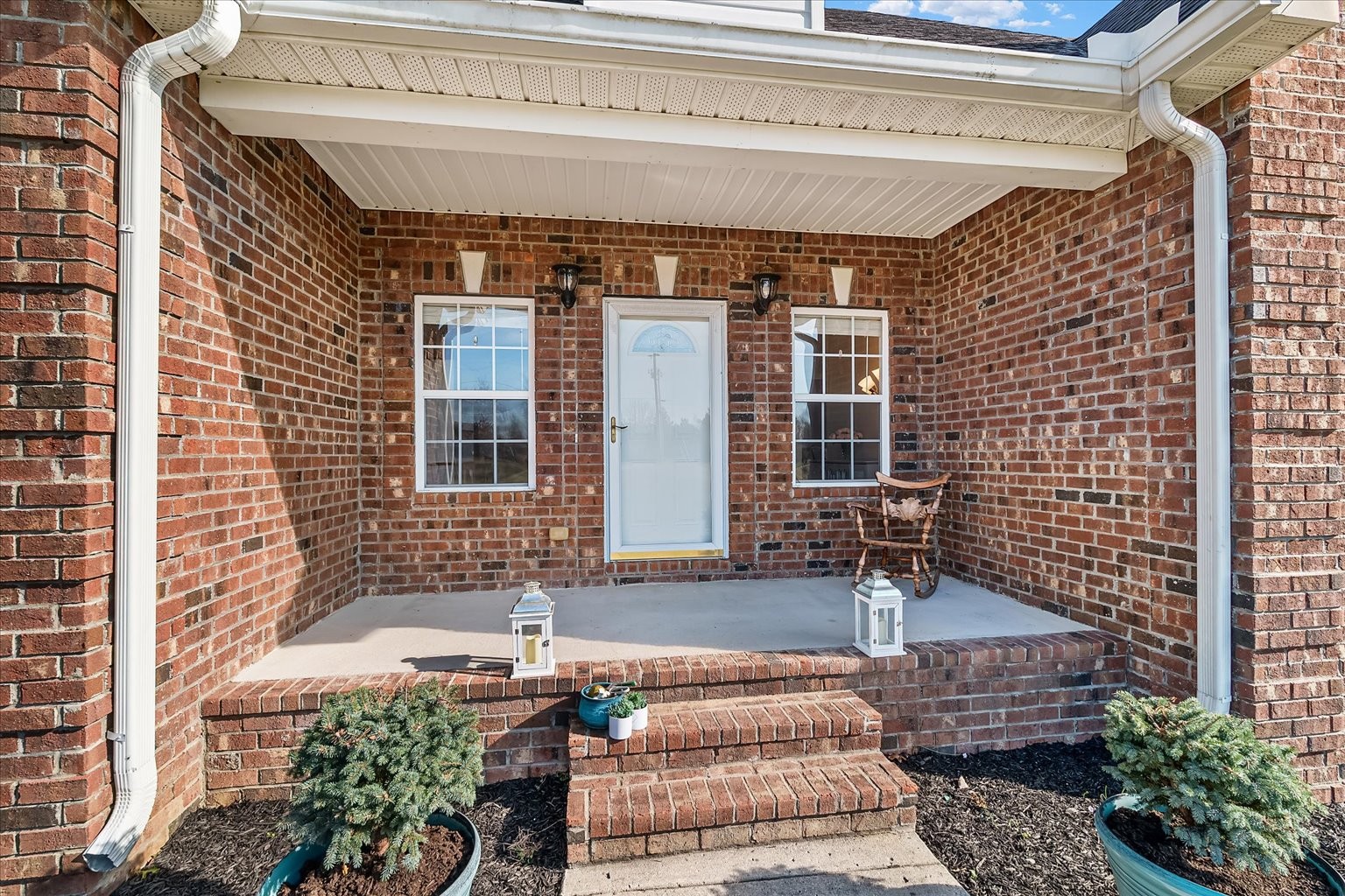 140 Glider Loop Eagleville, TN 37060 - Photo 5 of 39 a front view of a house with large windows