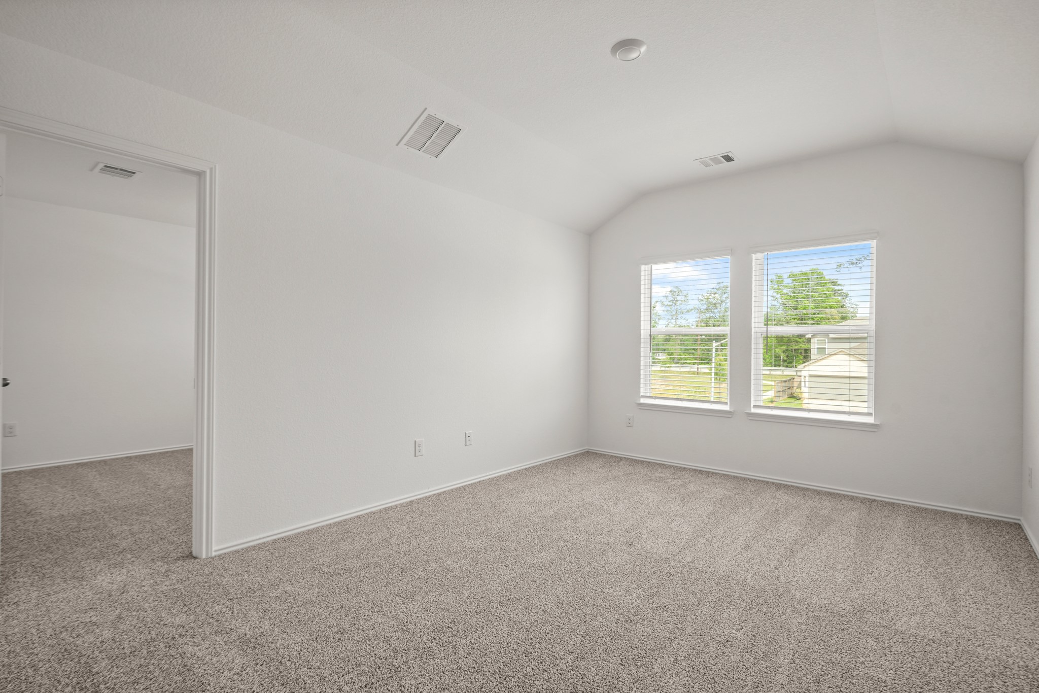 543 Belle Spgs Lane Conroe, TX 77301 - Photo 7 of 19 a view of an empty room with a window