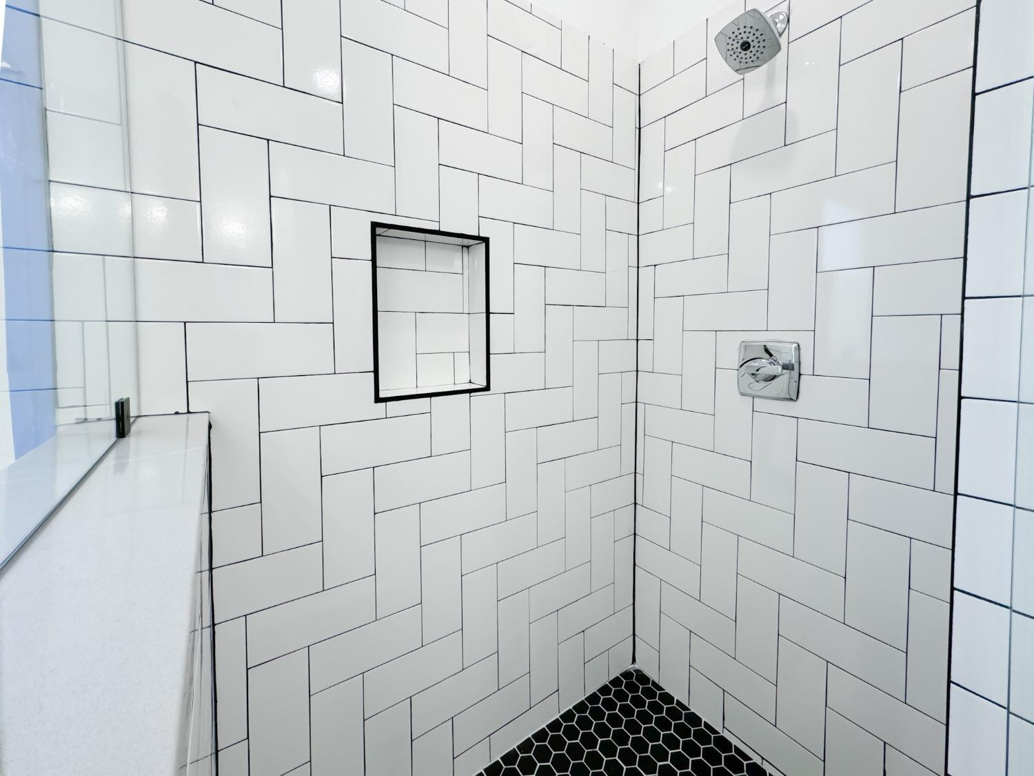 1301 Abbey Road Wolfforth, TX 79382 - Photo 16 of 24 a bathroom with a shower