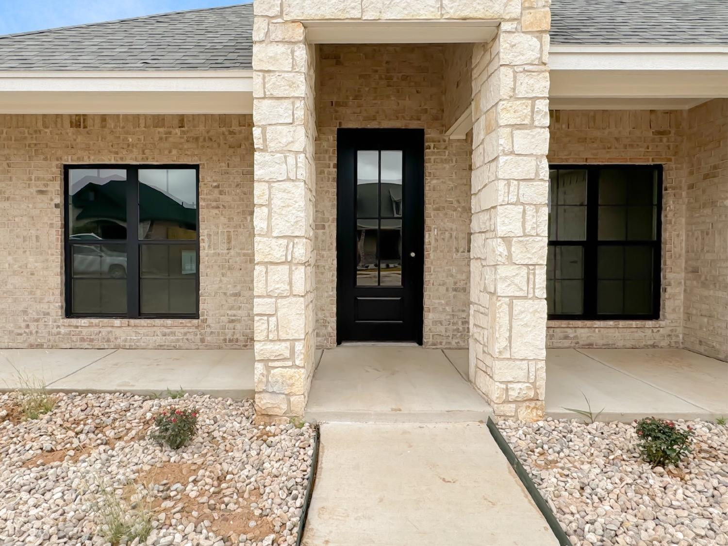1301 Abbey Road Wolfforth, TX 79382 - Photo 3 of 24 a front view of a house