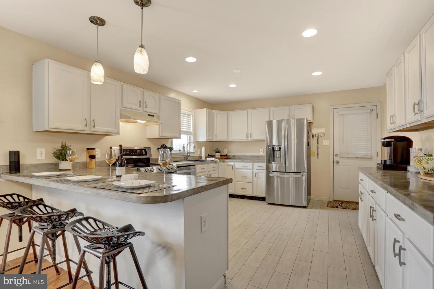 240 Mud College Road Littlestown, PA 17340 - Photo 10 of 36 Amazing kitchen with breakfast bar, new floors....
