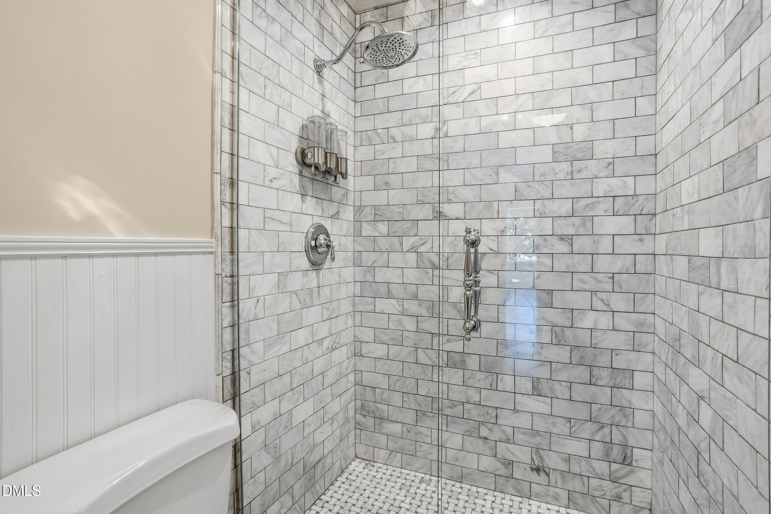 730 Washington Street, Unit 205 Raleigh, NC 27605 - Photo 19 of 23 a bathroom with a toilet and a shower