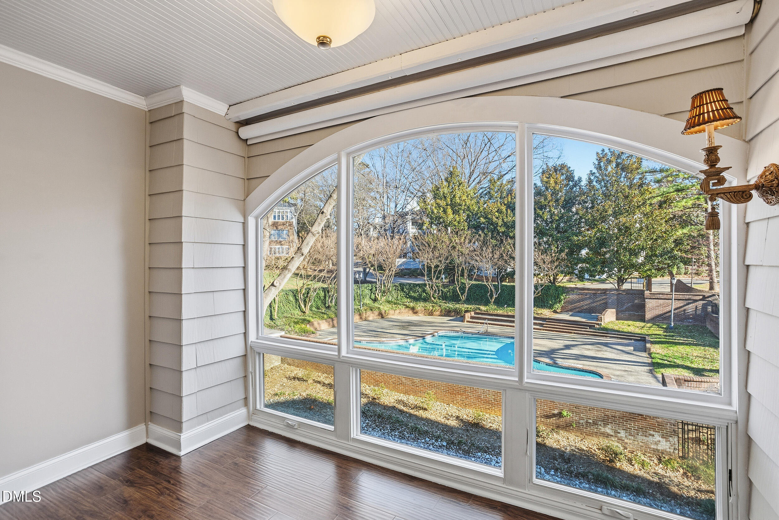 730 Washington Street, Unit 205 Raleigh, NC 27605 - Photo 4 of 23 a view of an empty room and wooden floor