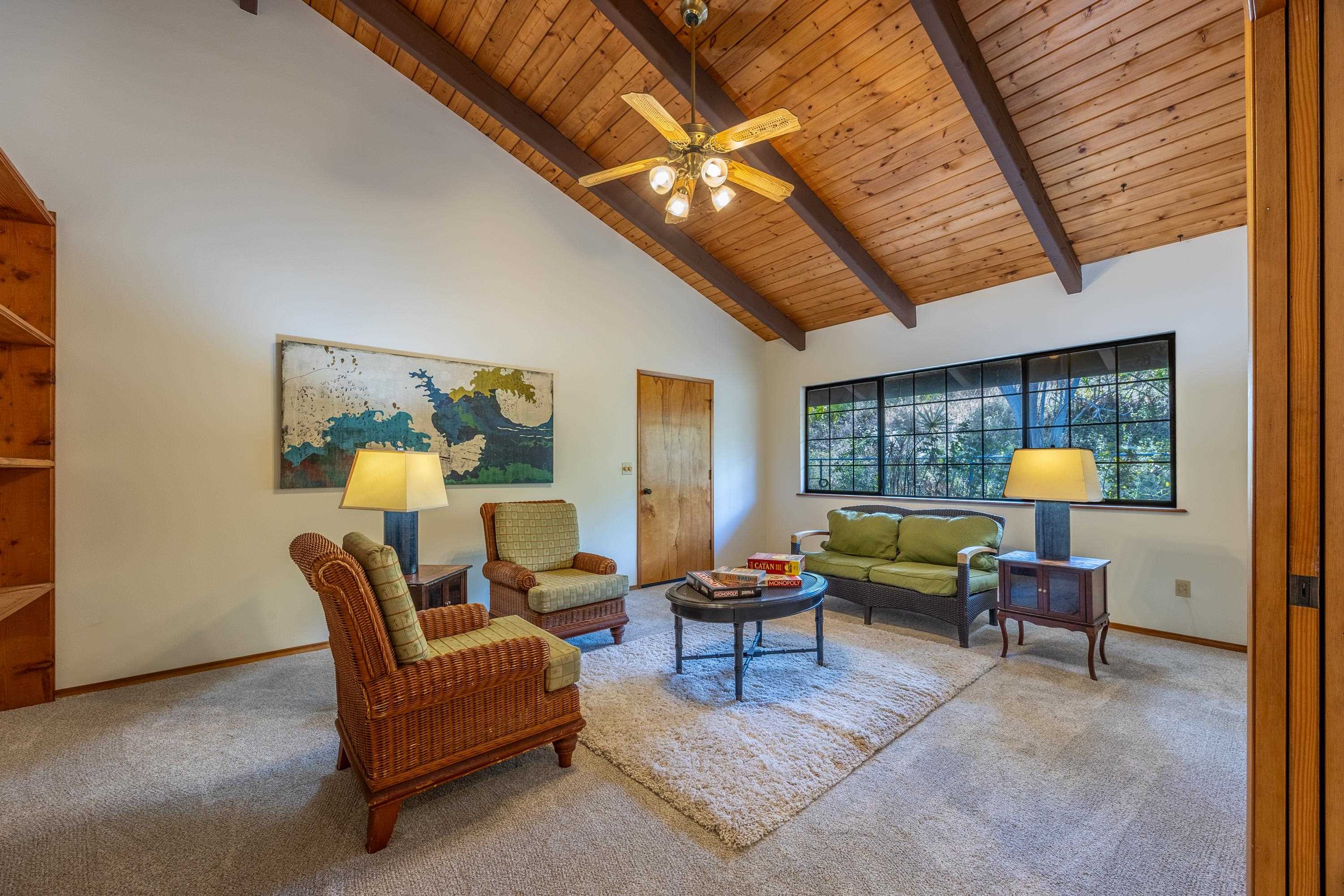 128 Hoopalua Drive Makawao, HI 96768 - Photo 18 of 50 a outdoor living space with furniture and a fireplace