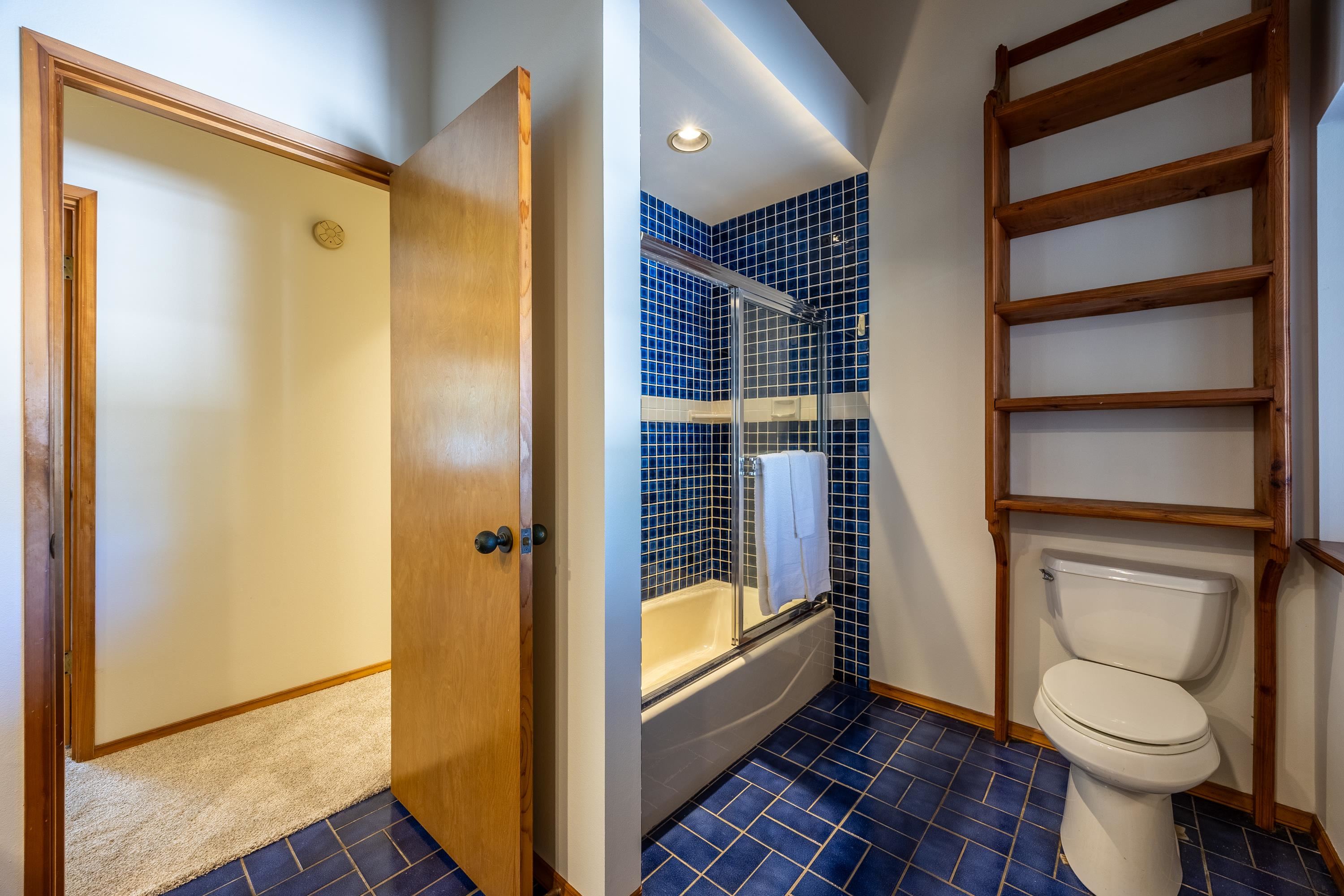 128 Hoopalua Drive Makawao, HI 96768 - Photo 22 of 50 a bathroom with a toilet and a shower