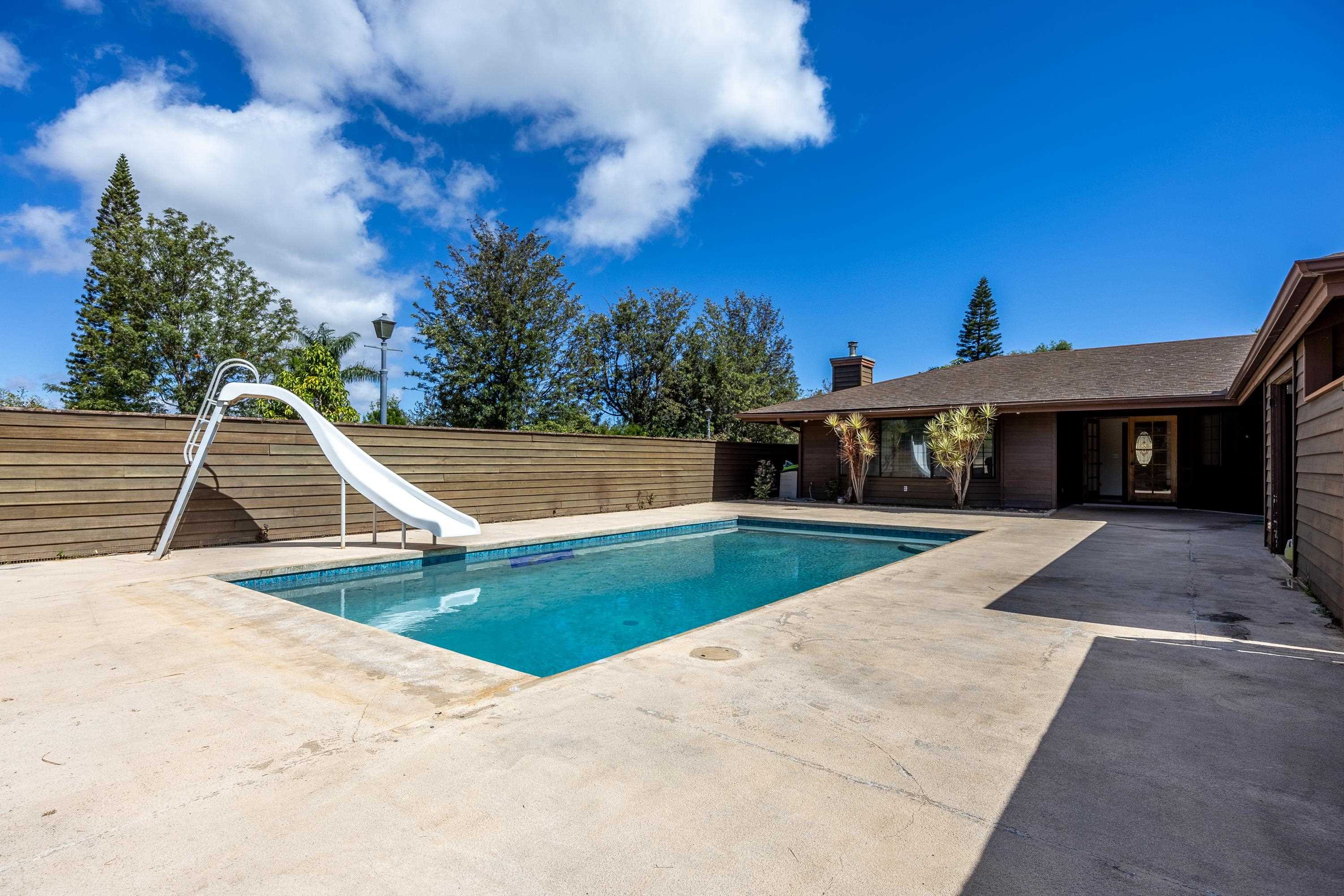 128 Hoopalua Drive Makawao, HI 96768 - Photo 31 of 50 a view of a house with swimming pool