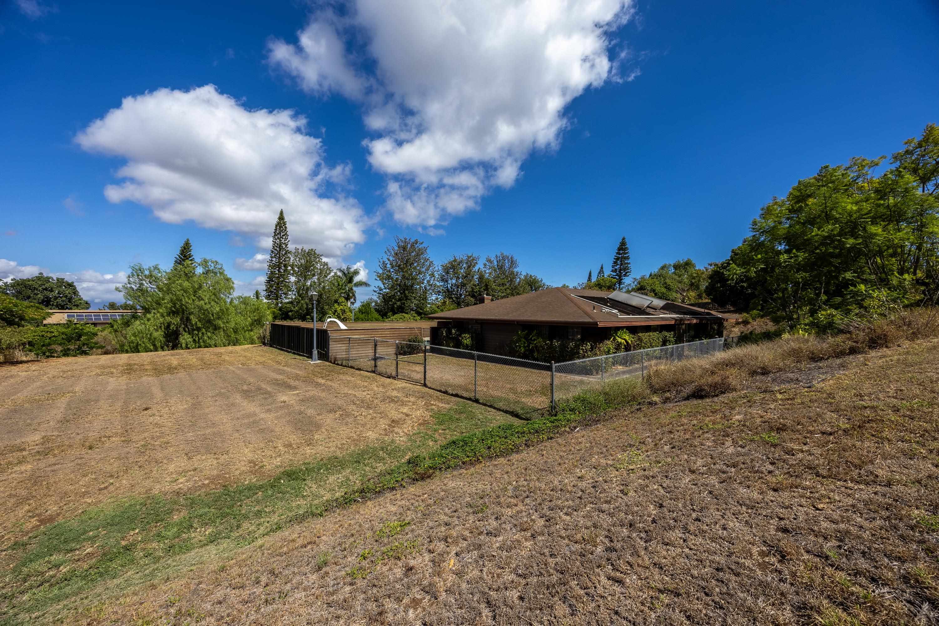 128 Hoopalua Drive Makawao, HI 96768 - Photo 37 of 50 a view of a garden with sitting area