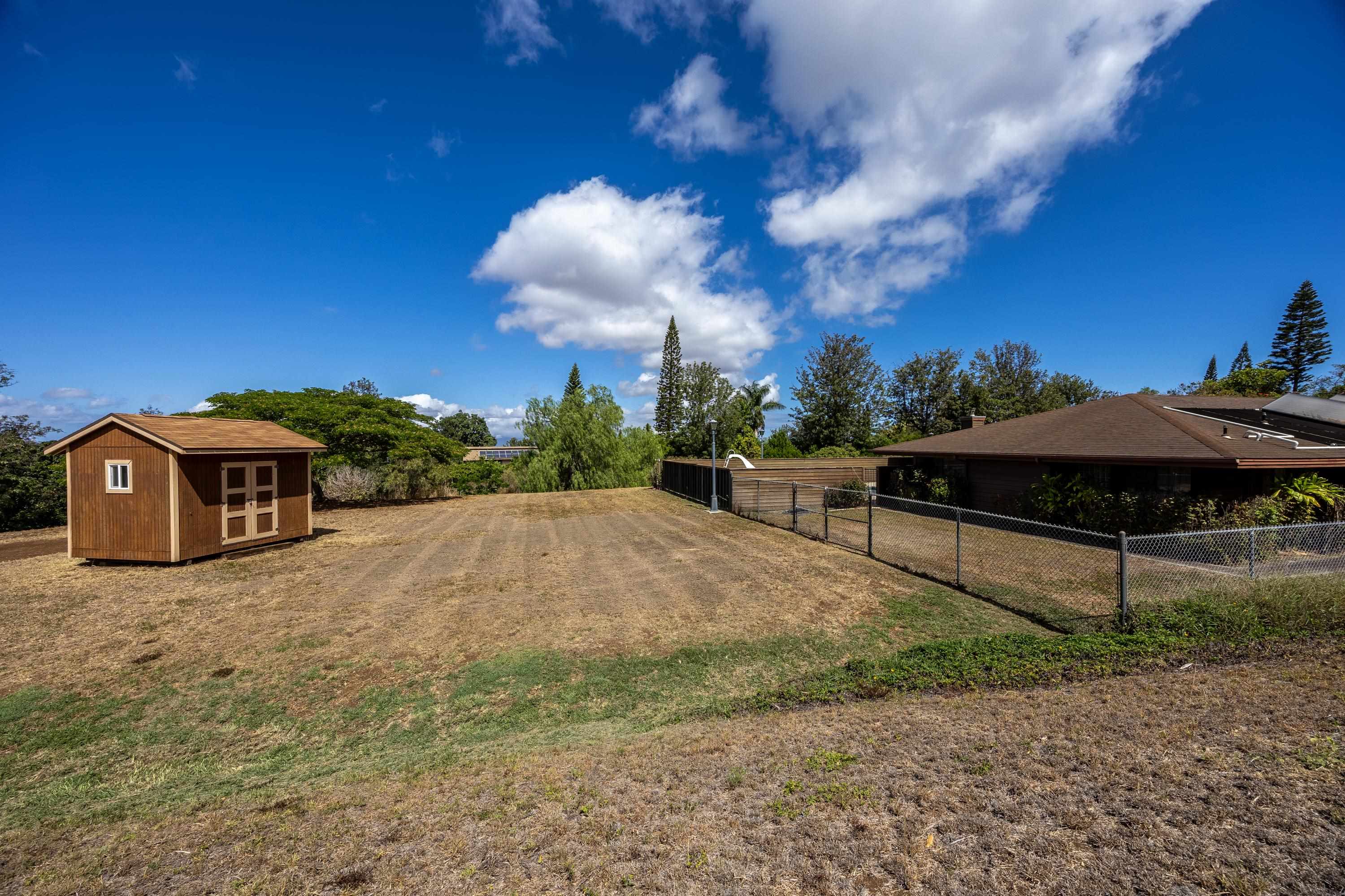 128 Hoopalua Drive Makawao, HI 96768 - Photo 38 of 50 a view of a backyard with sitting area
