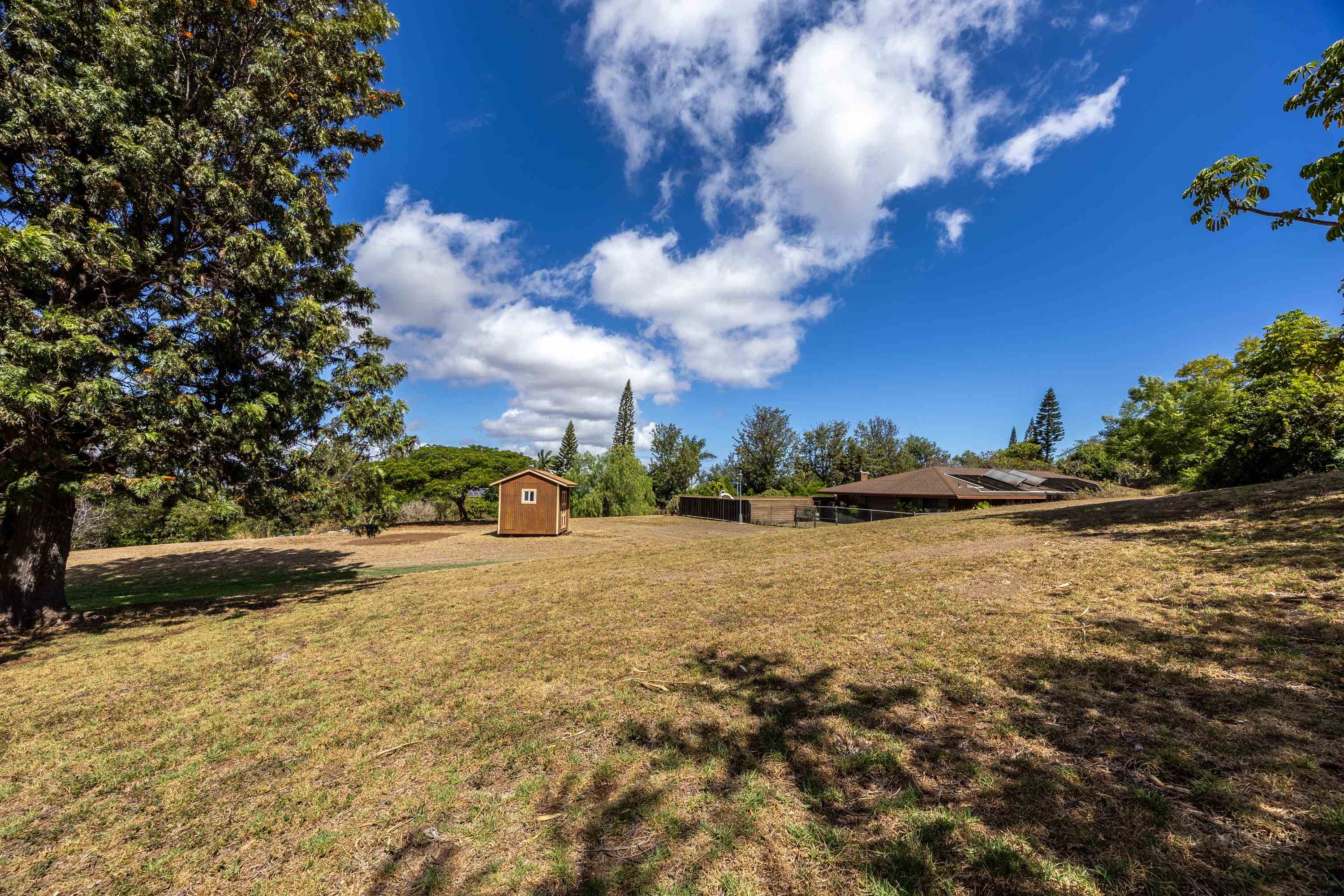 128 Hoopalua Drive Makawao, HI 96768 - Photo 40 of 50 a view of an outdoor space and a yard