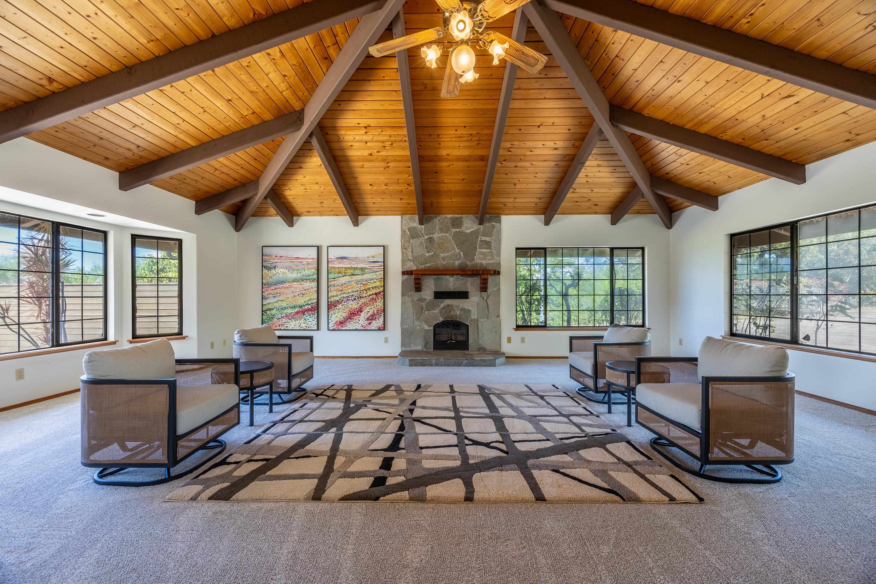128 Hoopalua Drive Makawao, HI 96768 - Photo 6 of 50 a living room with furniture