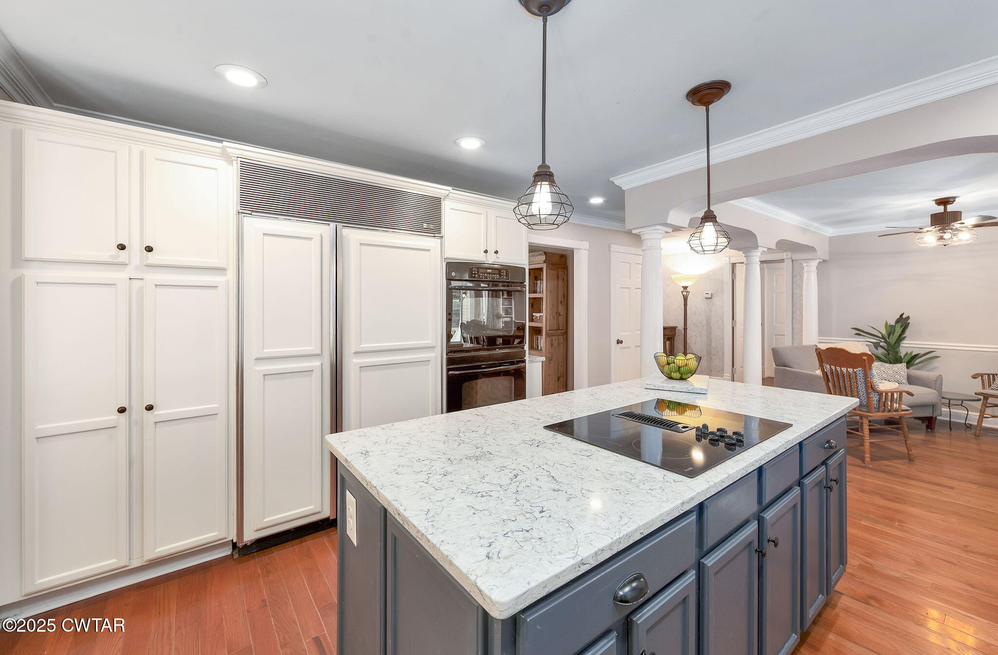 114 Old Stage Road Jackson, TN 38305 - Photo 11 of 50 a kitchen with sink cabinets and wooden floor