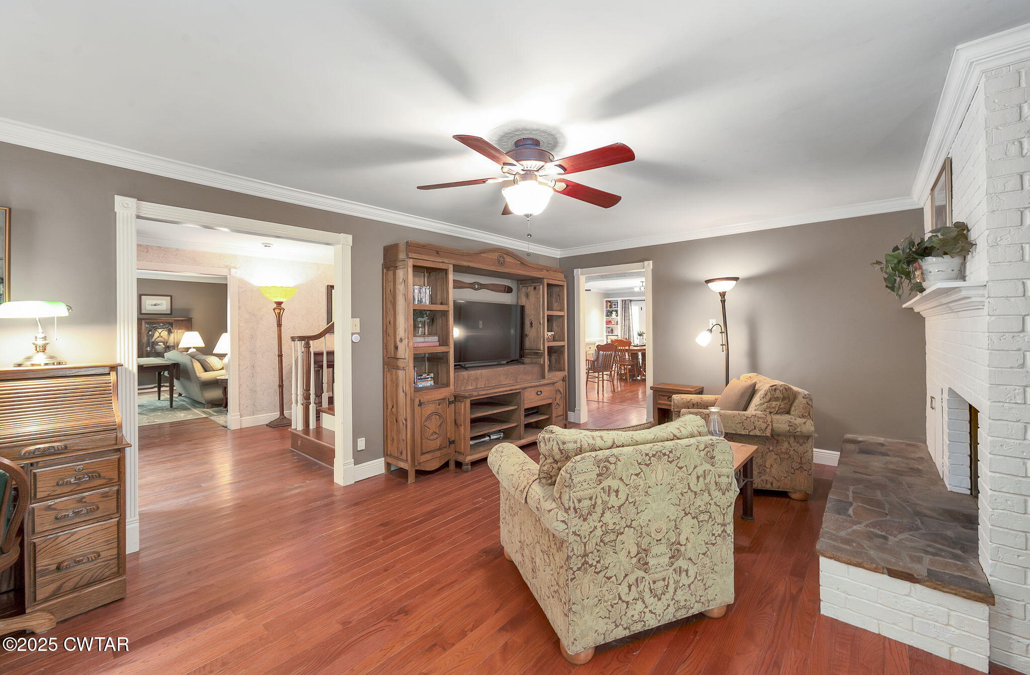 114 Old Stage Road Jackson, TN 38305 - Photo 16 of 50 a living room with fireplace furniture and a flat screen tv