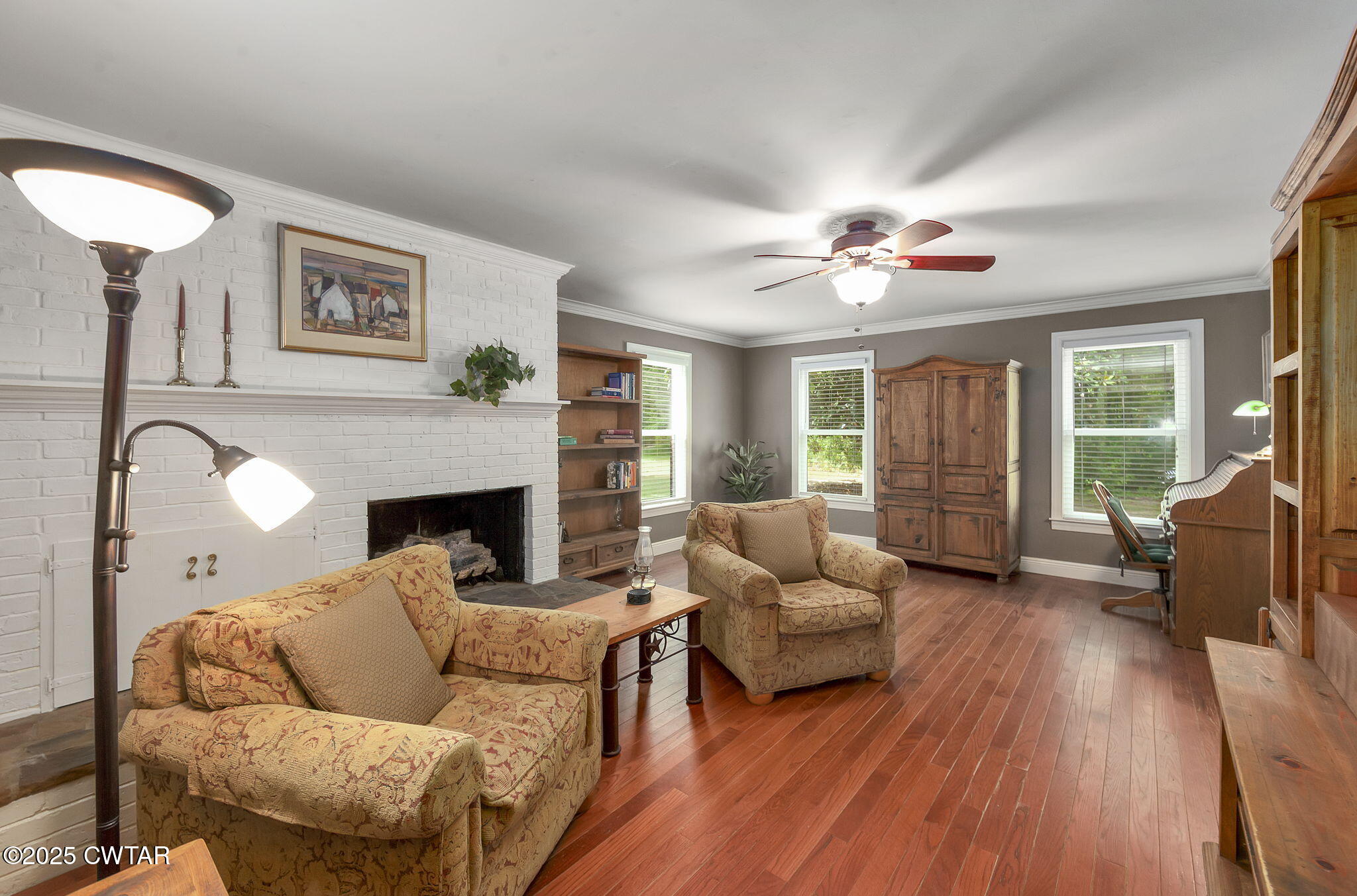 114 Old Stage Road Jackson, TN 38305 - Photo 17 of 50 a living room with furniture and a fireplace