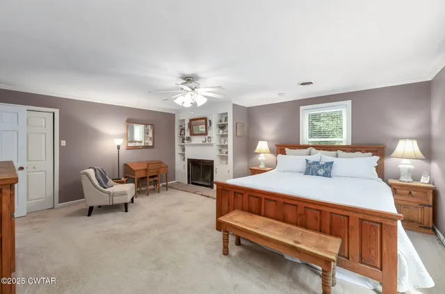 a bedroom with a bed and furniture