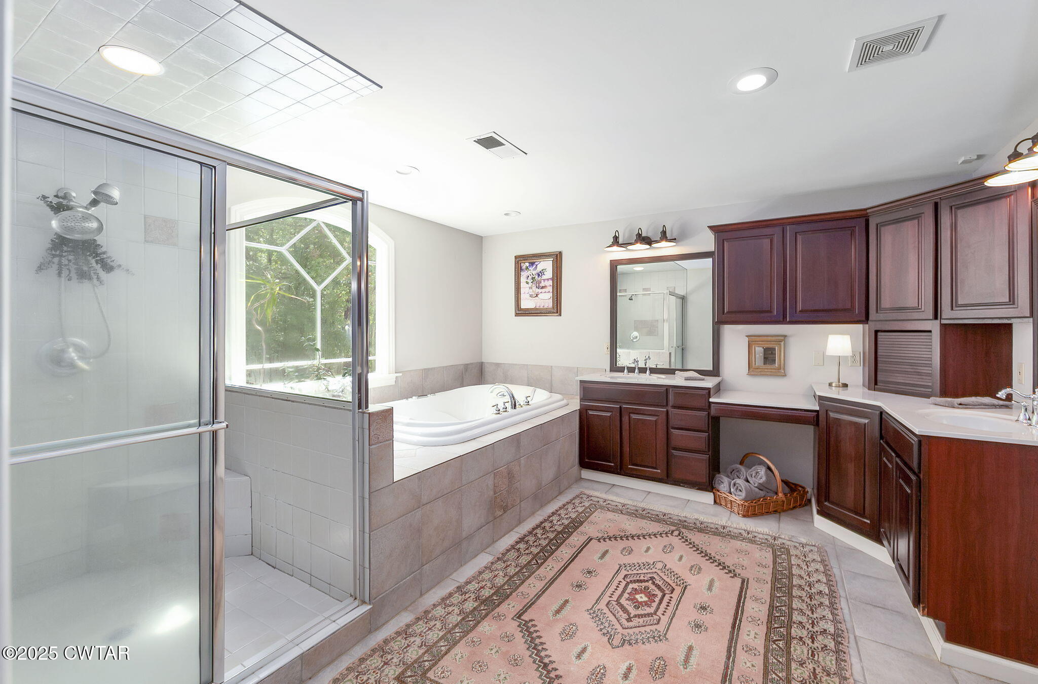 114 Old Stage Road Jackson, TN 38305 - Photo 23 of 50 a kitchen with kitchen island granite countertop a sink and wooden cabinets