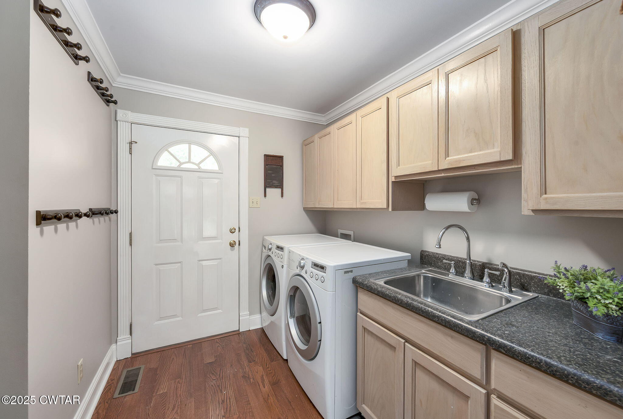 114 Old Stage Road Jackson, TN 38305 - Photo 37 of 50 a kitchen with a sink cabinets and a window