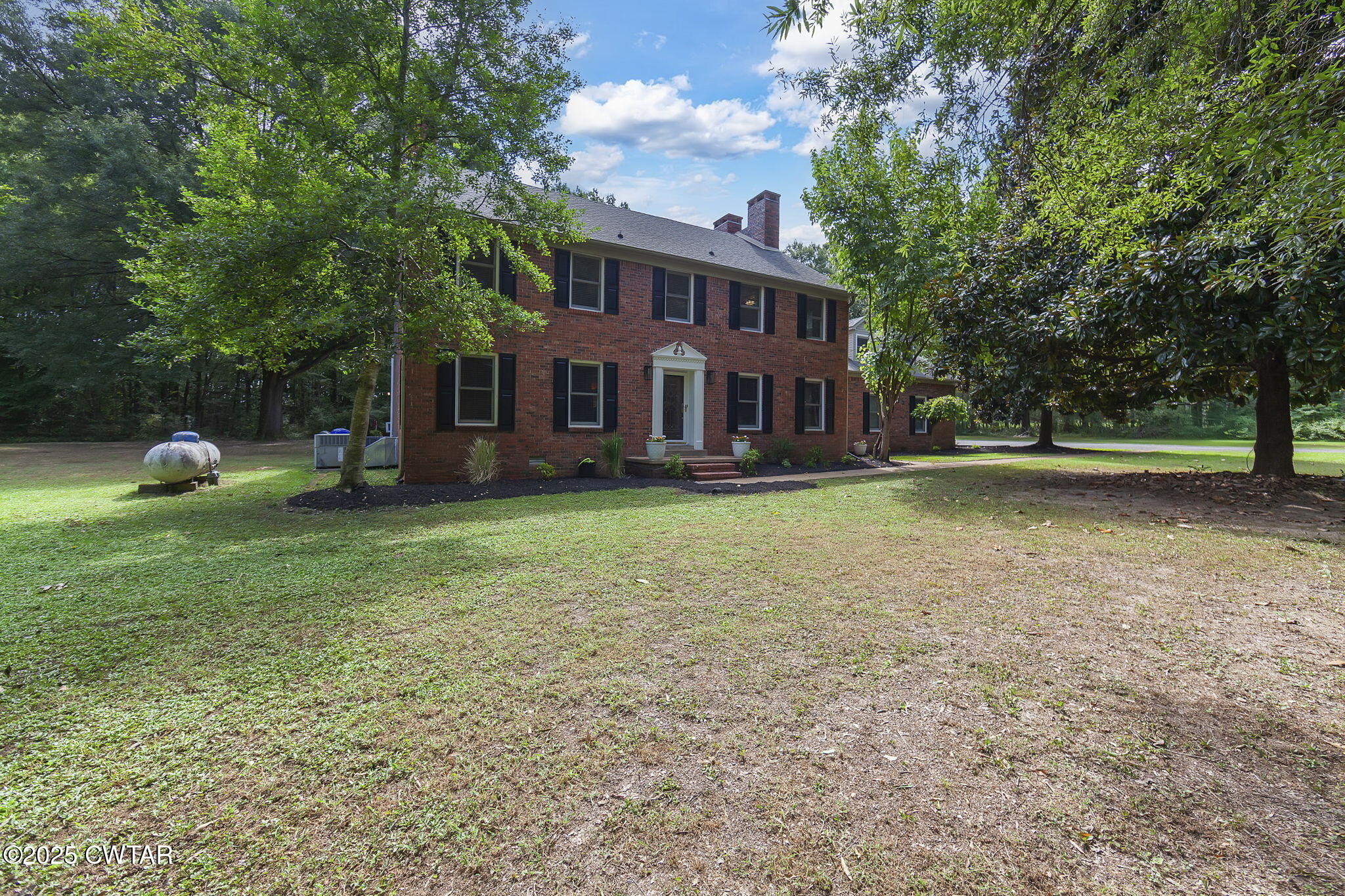114 Old Stage Road Jackson, TN 38305 - Photo 49 of 50 a view of a house with a yard