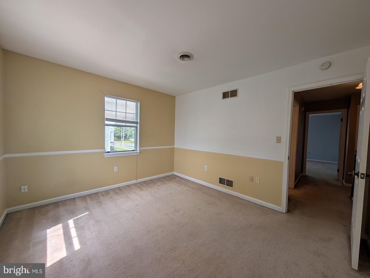 859 Old Silver Springs Road Mechanicsburg, PA 17055 - Photo 13 of 28 an empty room with windows