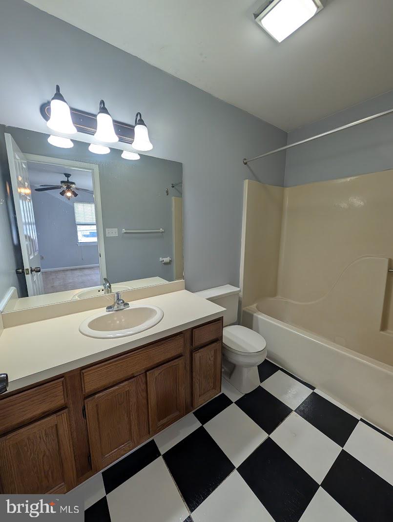 859 Old Silver Springs Road Mechanicsburg, PA 17055 - Photo 16 of 28 a bathroom with a sink toilet a mirror and shower