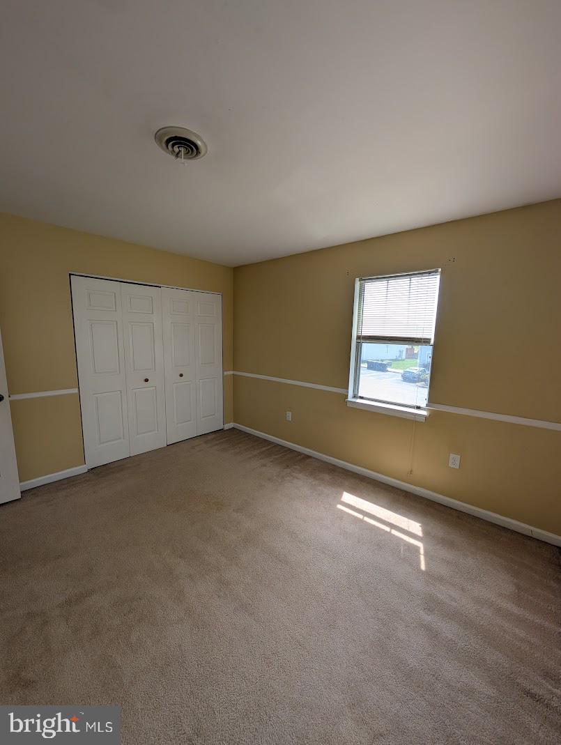 859 Old Silver Springs Road Mechanicsburg, PA 17055 - Photo 10 of 28 an empty room with windows