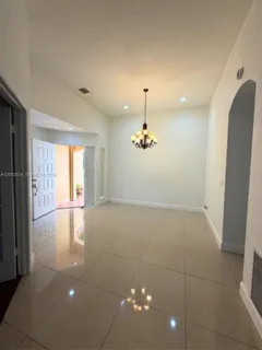 a view of empty room with windows