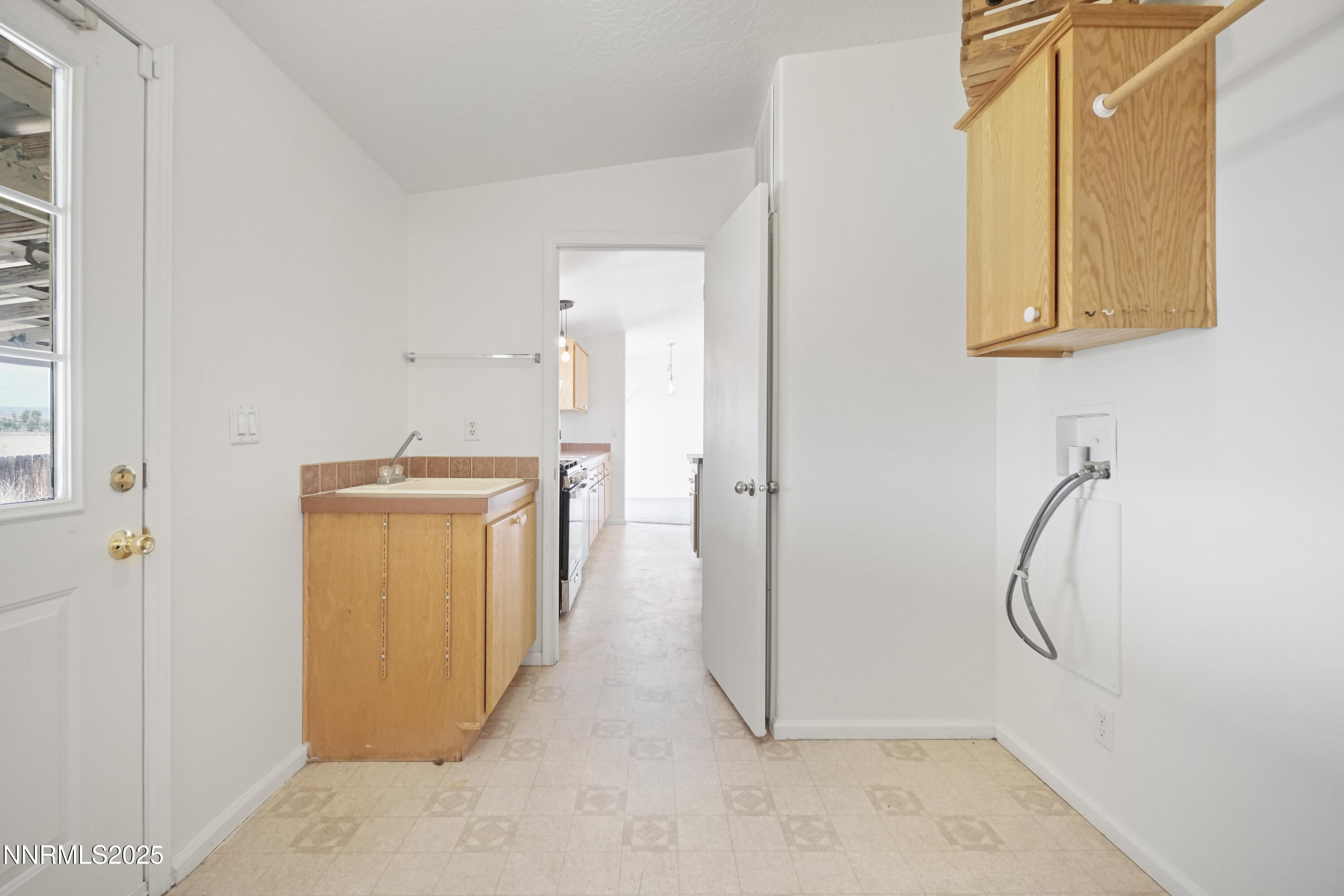 11575 Fulkerson Road Fallon, NV 89406 - Photo 19 of 25 a storage room with a washer and dryer