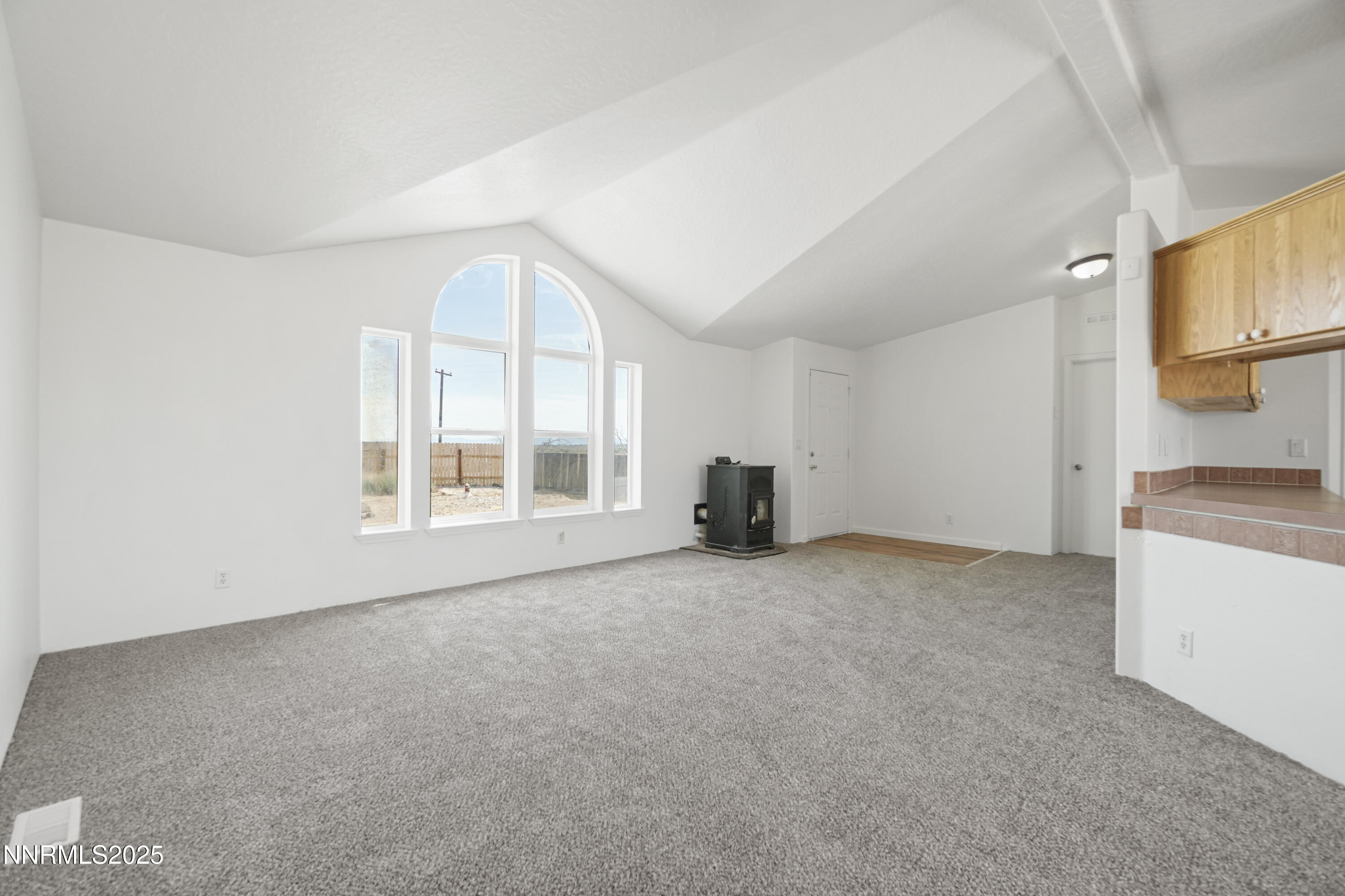 11575 Fulkerson Road Fallon, NV 89406 - Photo 5 of 25 a view of an empty room with a window