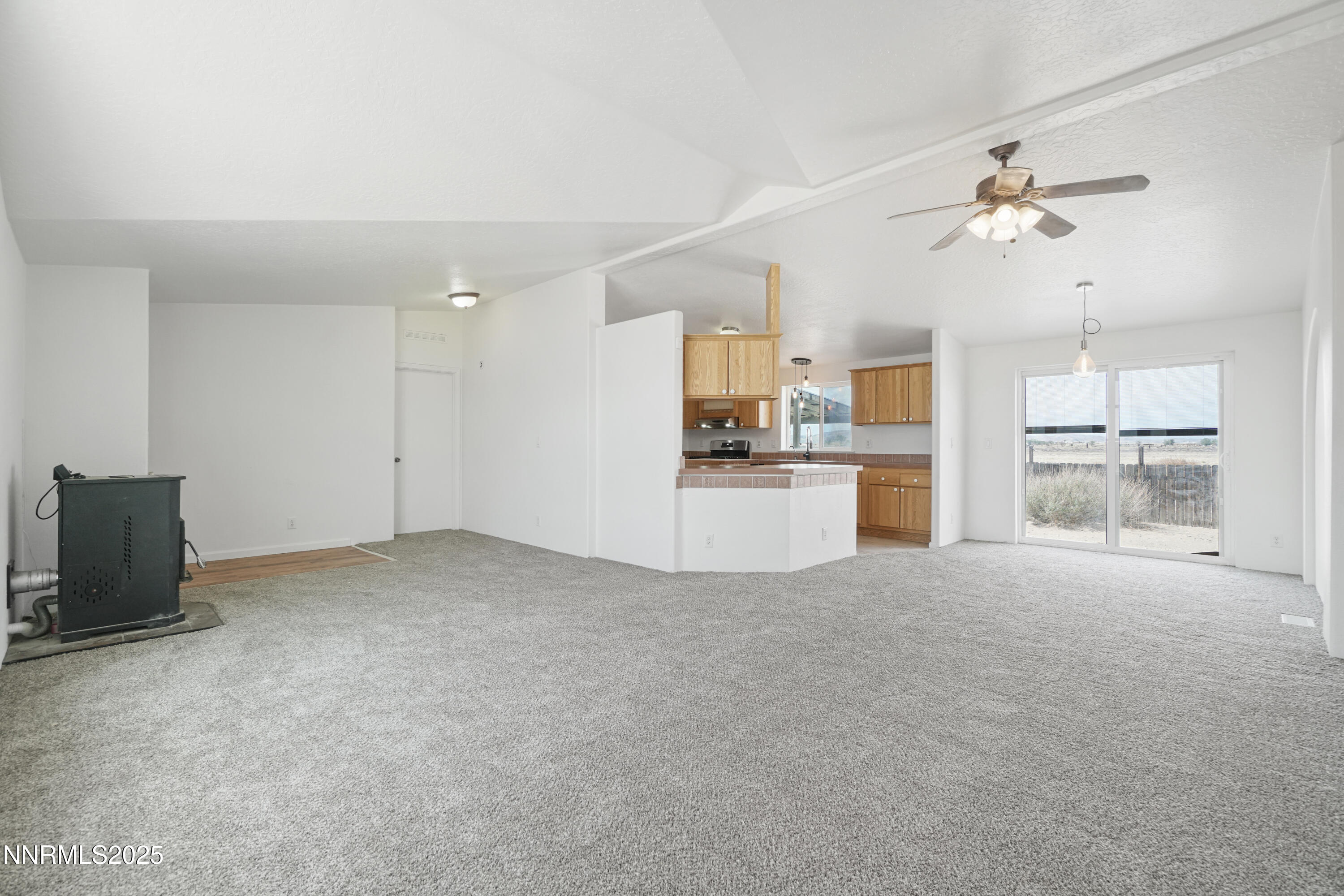 11575 Fulkerson Road Fallon, NV 89406 - Photo 6 of 25 a view of a kitchen with a sink and a refrigerator